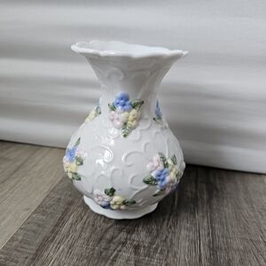 White Ceramic Vase with Pastel Floral Relief